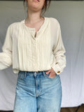 Damesblouse van 100% zijde in crèmewit – maat L/XL