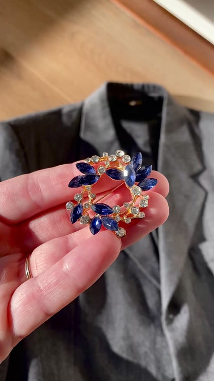 Blauw met goud broche