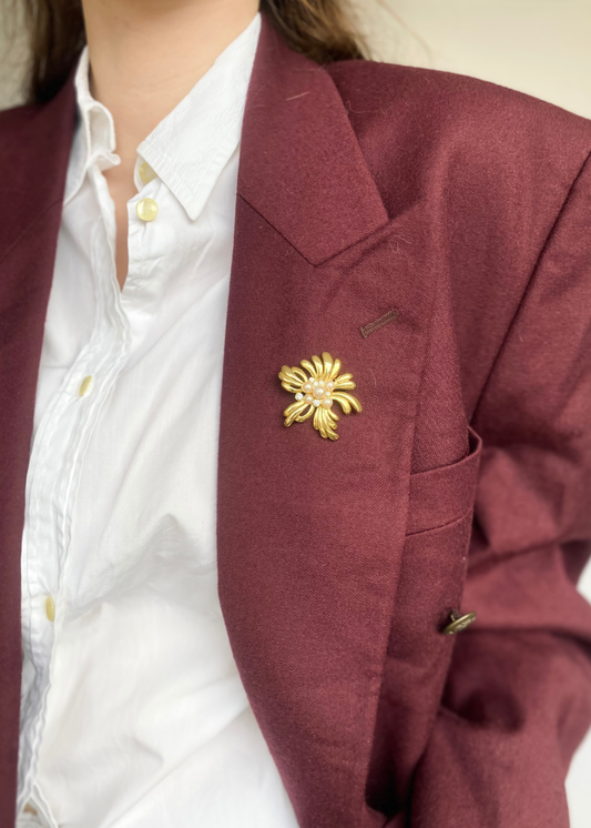 Gouden bloemen broche