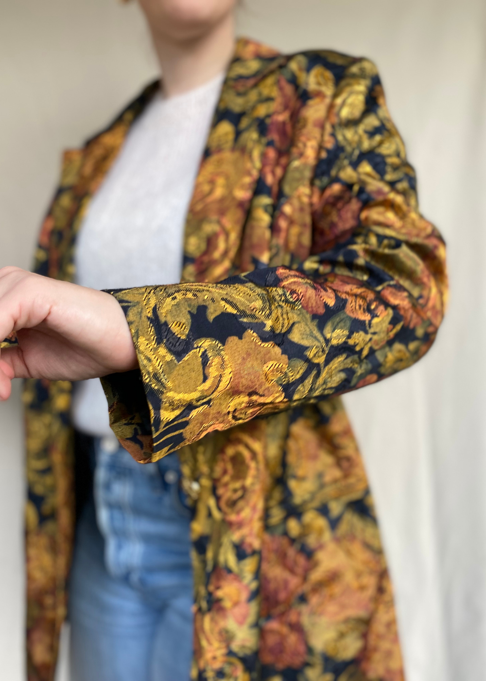 Glimmende blazer met bloemenprint - maat L/XL