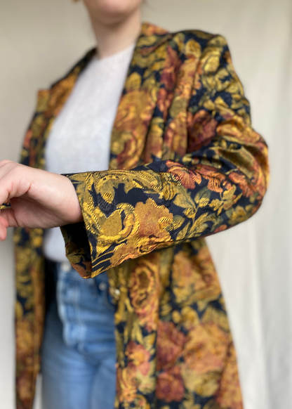 Glimmende blazer met bloemenprint - maat L/XL