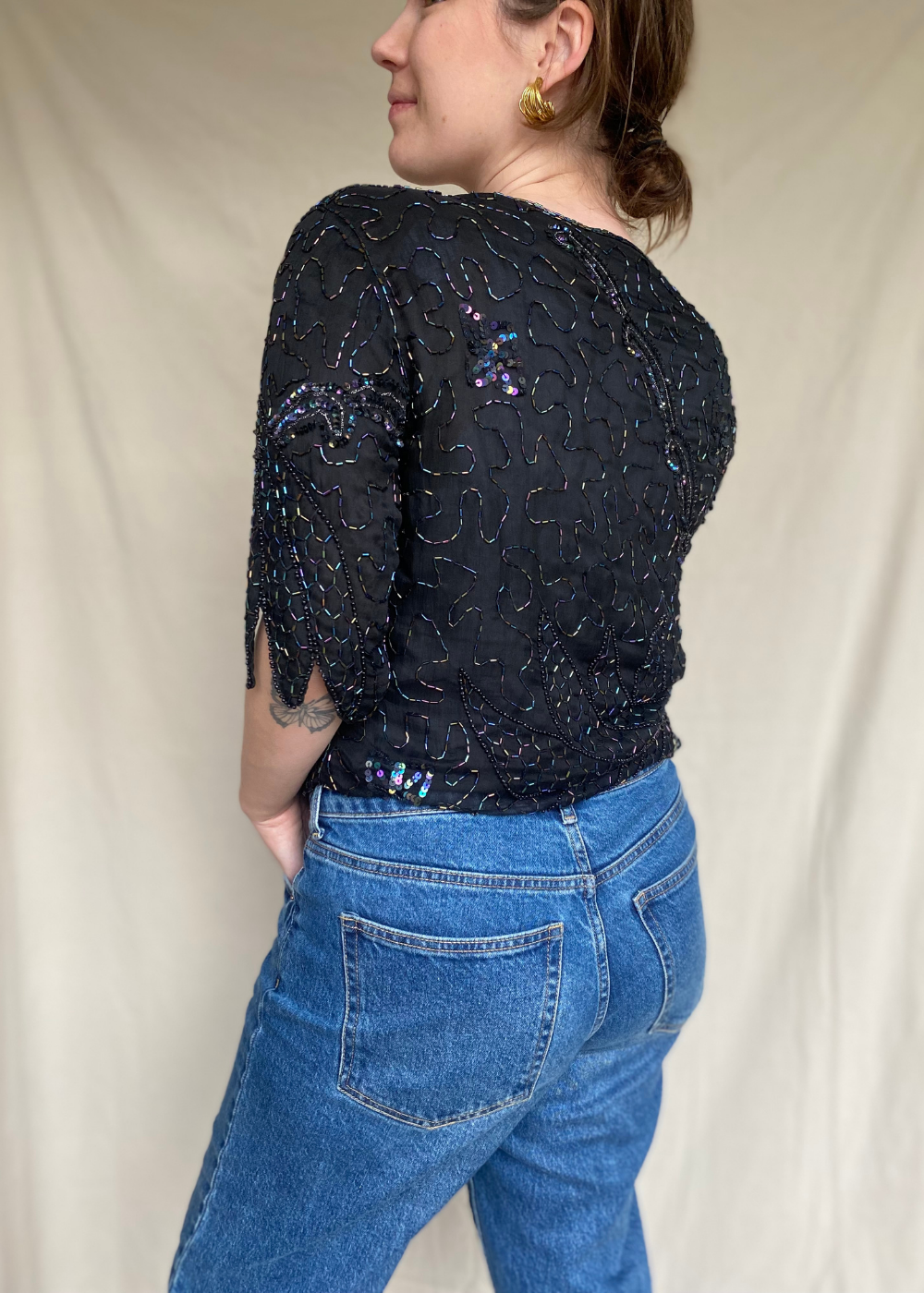 Glittertop met korte mouwen – maat L