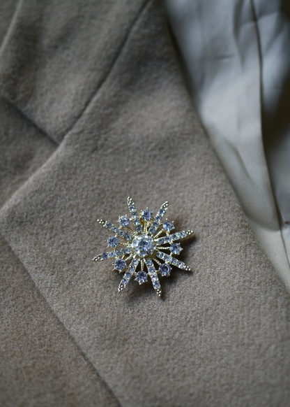 Goud zilveren broche